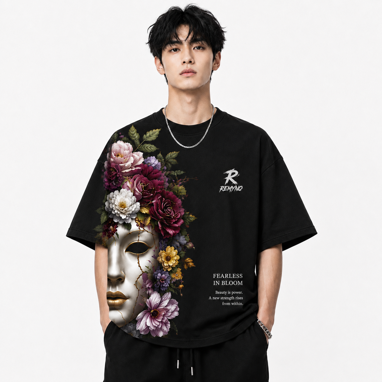 Cotton T-shirt with "REMYNO" brand logo print.