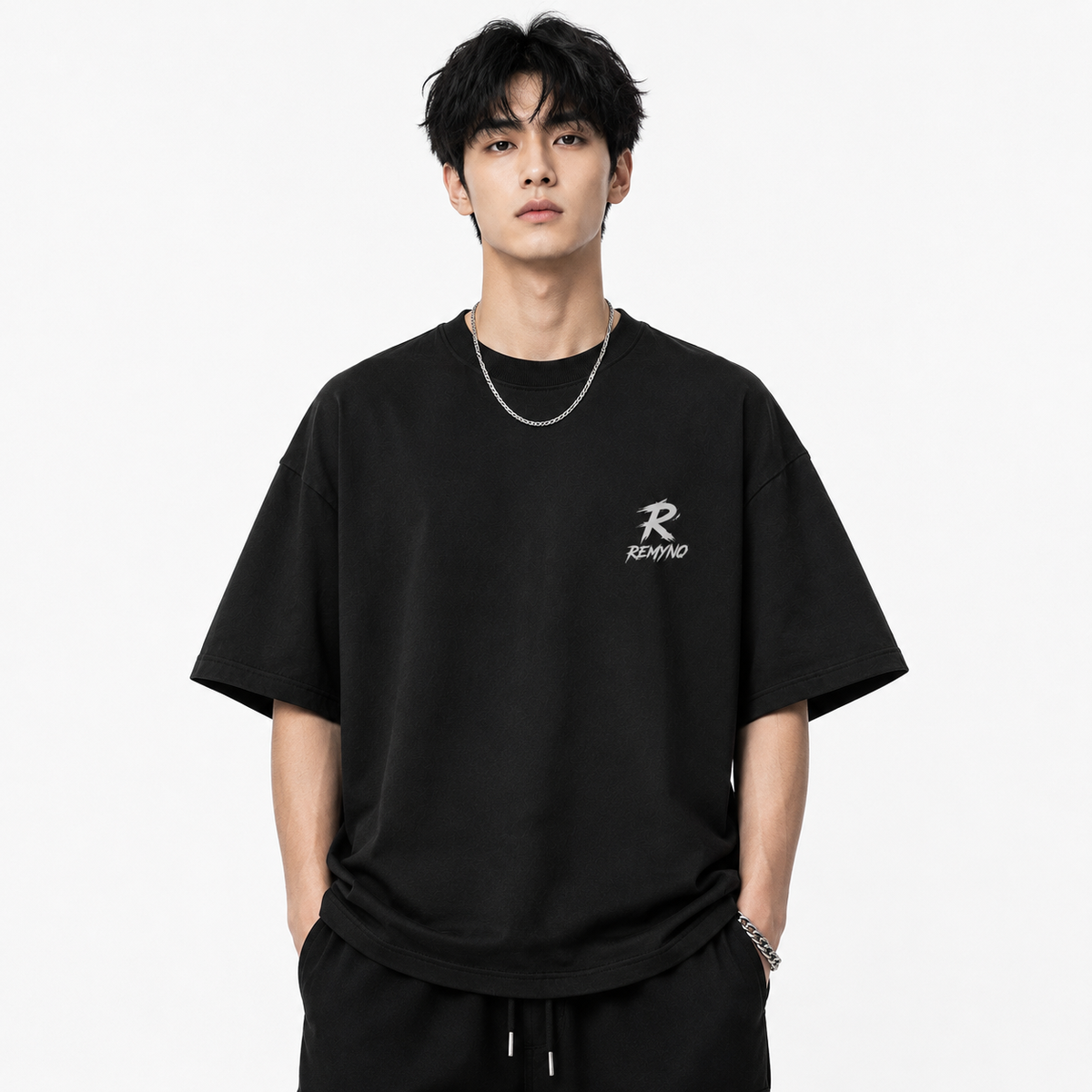 Cotton T-shirt with "REMYNO" brand logo print.
