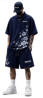 Cotton T-shirt printed with the "REMYNO" brand logo.