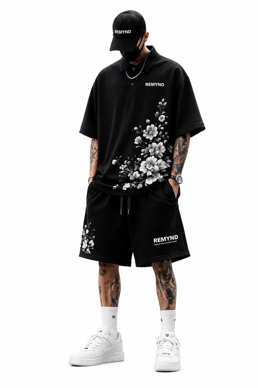 Cotton T-shirt printed with the "REMYNO" brand logo.