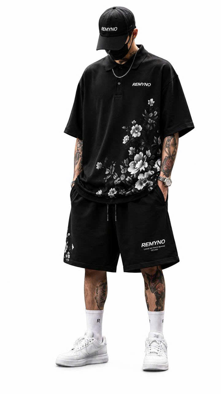 Cotton T-shirt printed with the "REMYNO" brand logo.